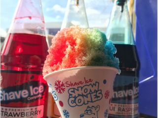 Snow Cones product in the sun with syrups